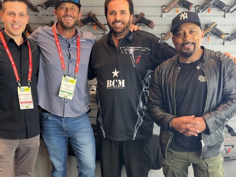 Jeremy with Taran Butler and Daymond John at SHOT Show